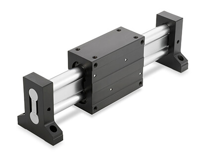 Twin shaft web design for high roll moment capacity, high rigidity, and ultra-smooth travel. End supported for gantry style or 'bridge' applications.